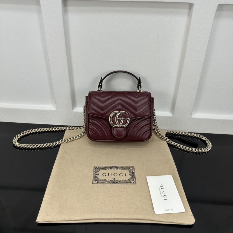 G*u*i top handle bags